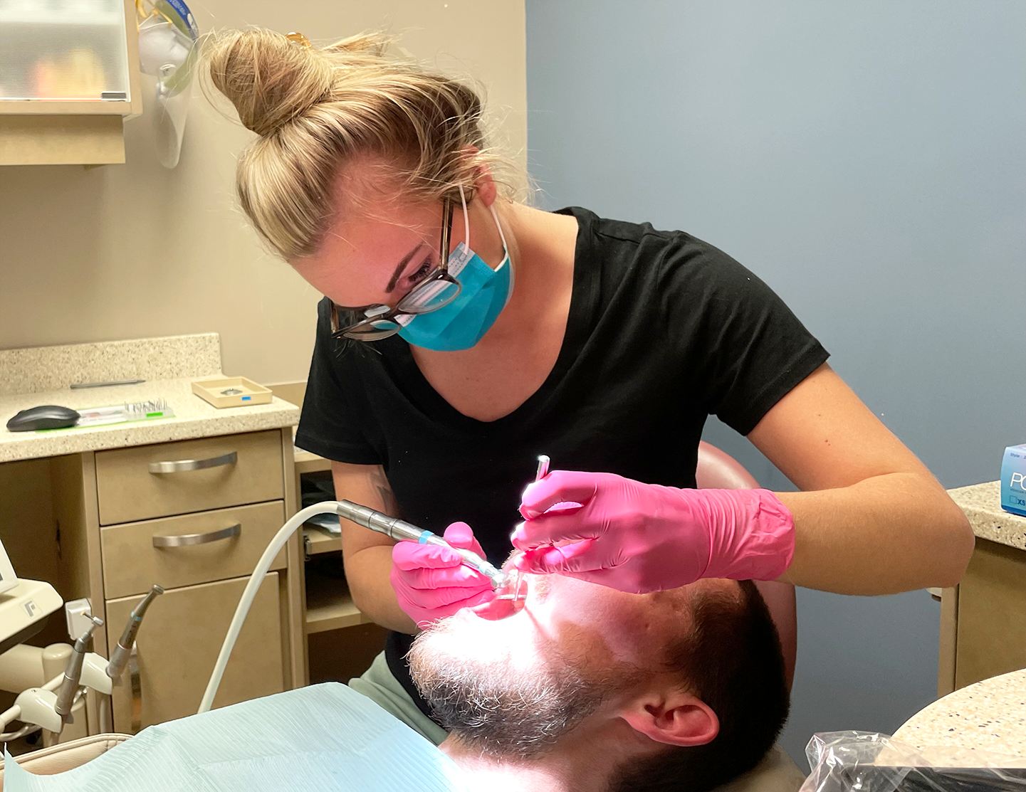 Dental Hygenist working on a patient